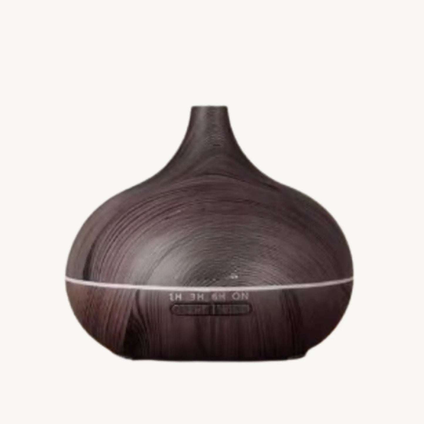 CALMARA diffuser in elegant wood design, promoting relaxation and atmosphere with gentle mist and warm light.