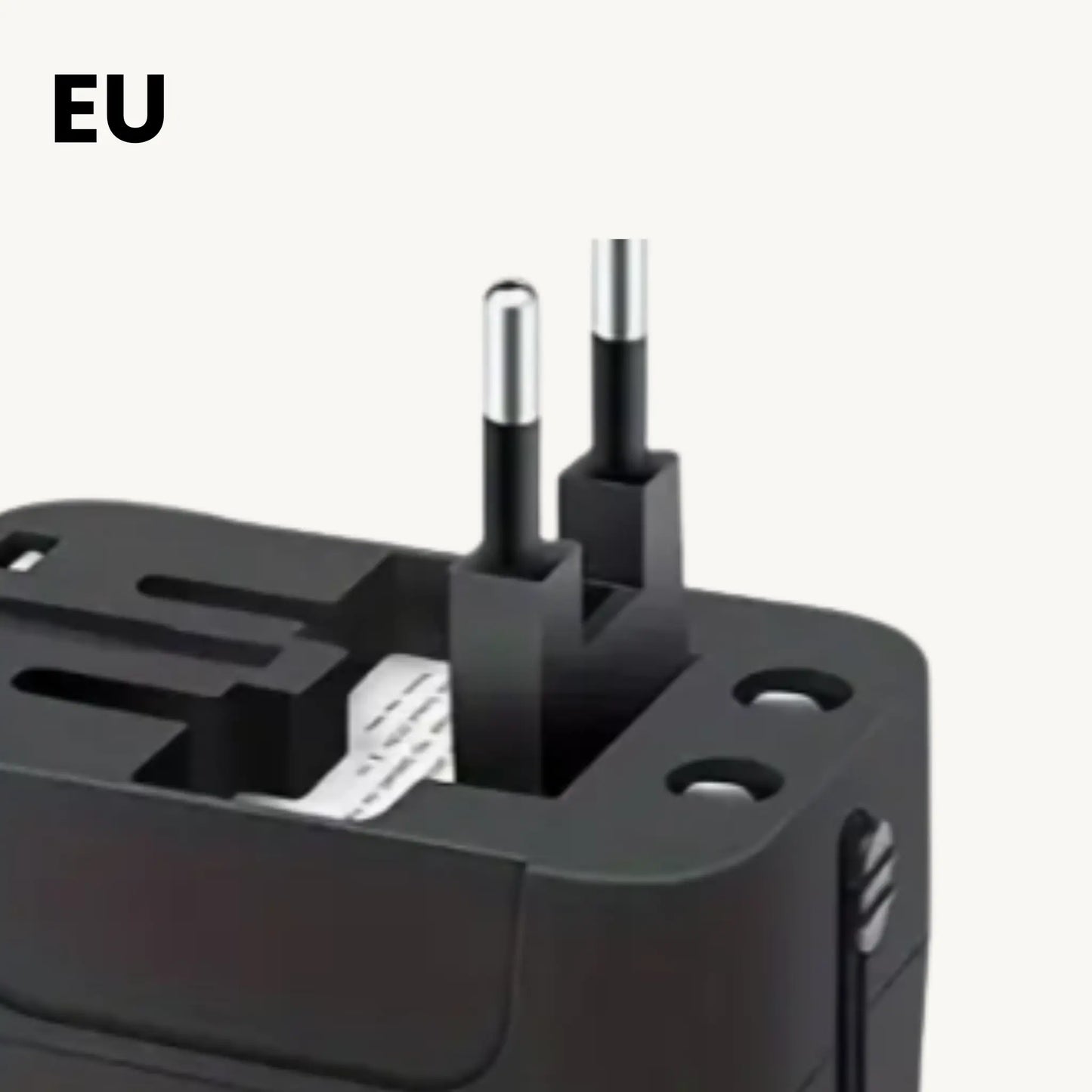 Close-up of ADAPTGO world adapter plug suited for EU countries, enabling worldwide charging.